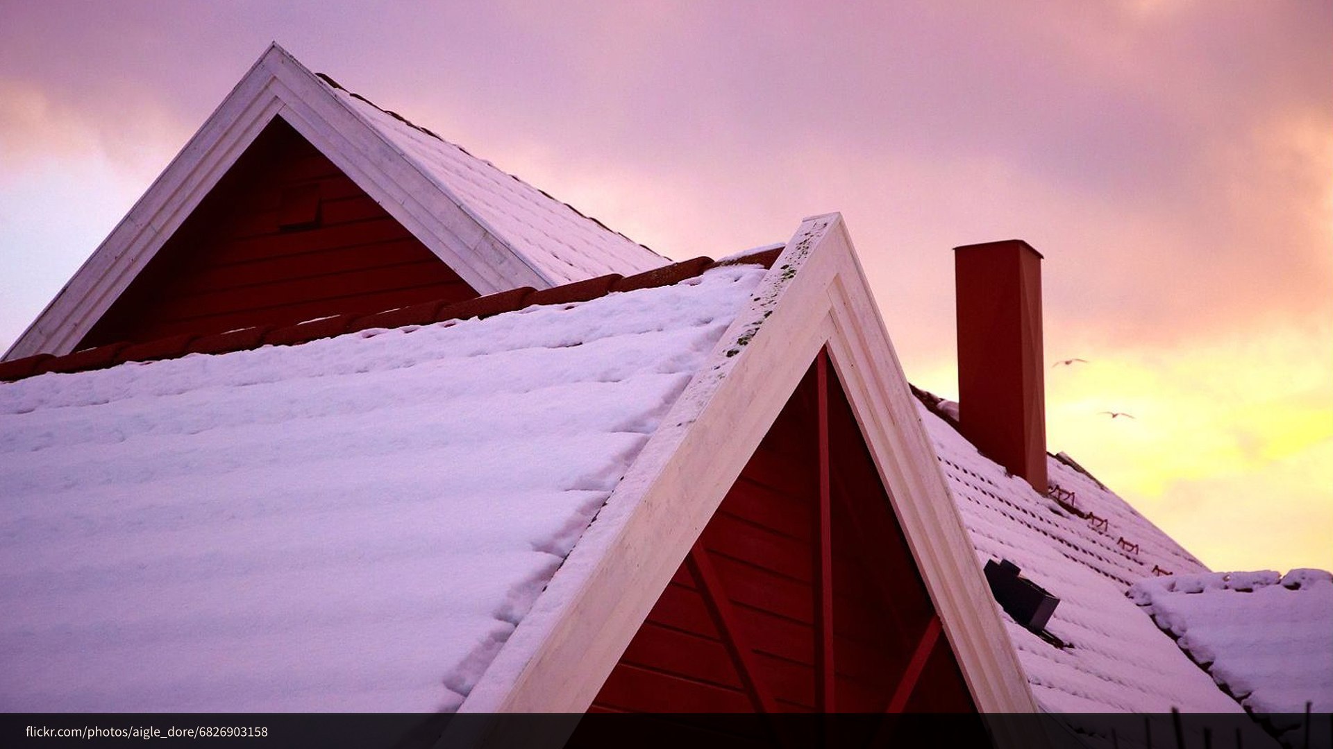 A photograph of a snow-covered roof